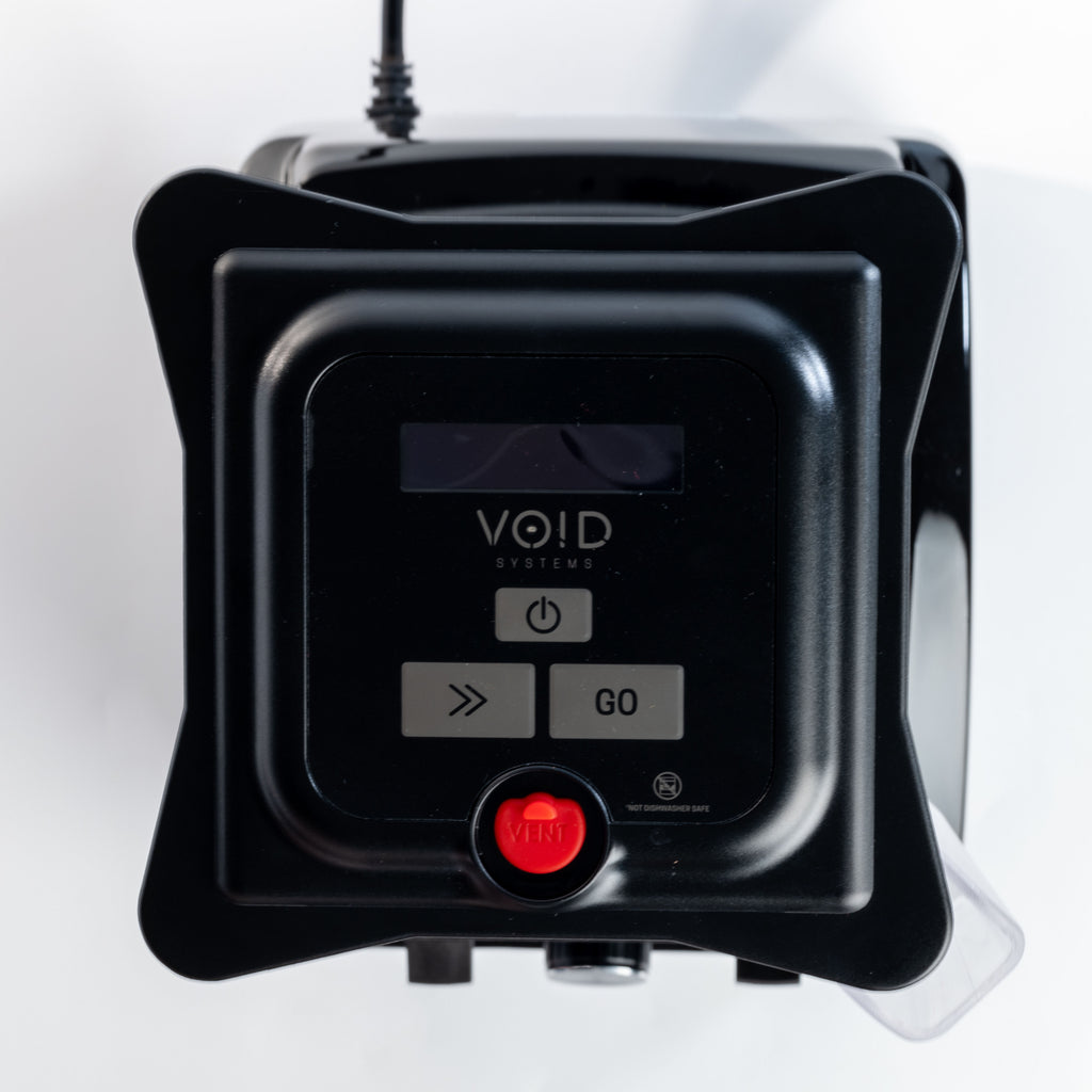 Top view of the VOID lid on the blender, showing its screen, buttons and vent