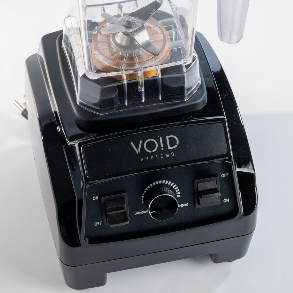 Close view of the black VOID Complete System motor base with speed dial and switches