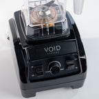 Close view of the black VOID Complete System motor base with speed dial and switches
